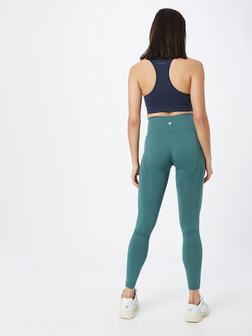 Athlecia Skinny Sports trousers 'Nagar' in Green