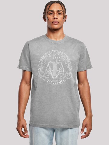 F4NT4STIC T-Shirt 'Harry Potter Hufflepuff Seal' in Grau: predná strana
