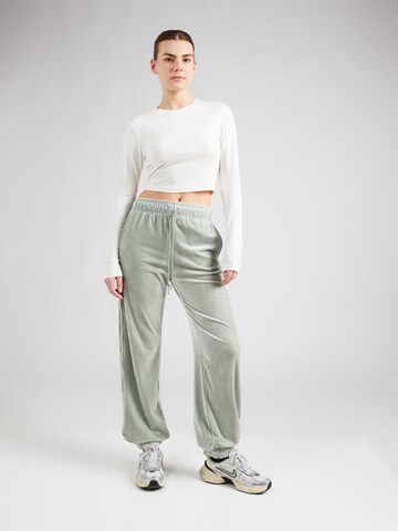 Nike Sportswear Tapered Trousers in Green
