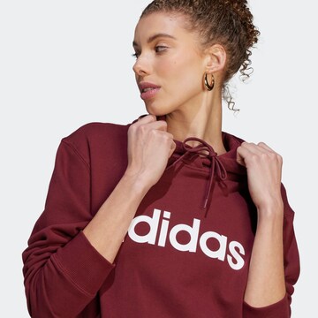 Sweat-shirt 'Essentials Linear' ADIDAS SPORTSWEAR en rouge