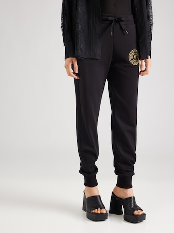 Tapered Pantaloni di Versace Jeans Couture in nero: frontale