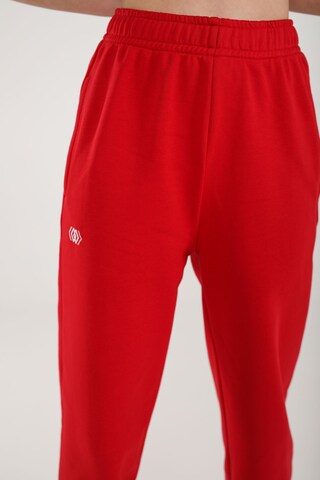 Loosefit Pantalon de sport ET Nos en rouge