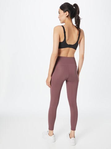 Skinny Pantaloni sportivi di PUMA in lilla