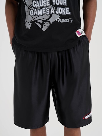 AND1regular Hlače - crna boja: prednji dio