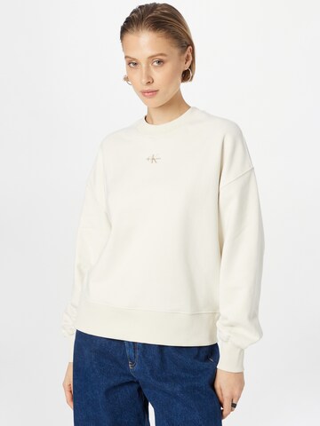 Calvin Klein Jeans Sweatshirt in Beige: predná strana