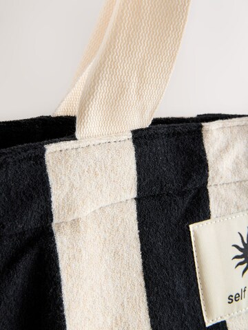 self. Shopper in Black