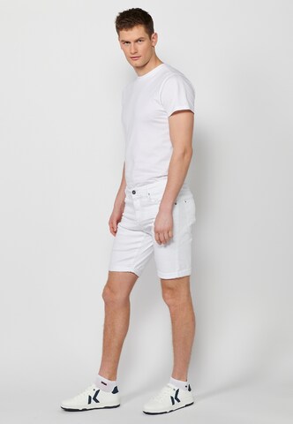 KOROSHI Slimfit Shorts in Weiß