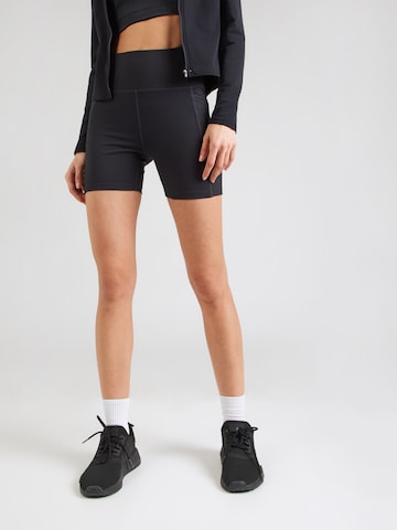 Girlfriend Collective Skinny Sportovní kalhoty – černá: přední strana