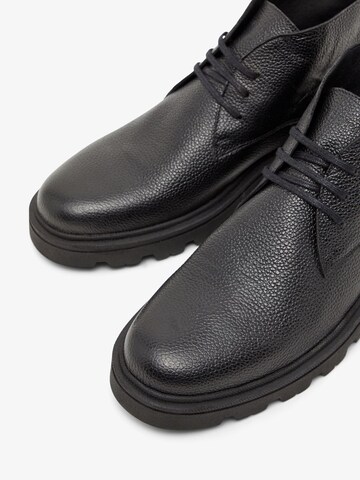 Boots stringati 'Sharp' di Bianco in nero