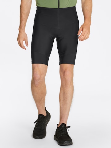 ZIENER Skinny Workout Pants 'NETAX X-GEL' in Black: front