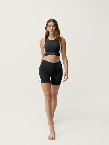 Born Living Yoga Skinny Sportbroek 'Latika' in Zwart