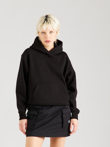 Sweat-shirt Calvin Klein Jeans en noir : devant