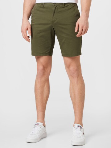 TOMMY HILFIGER Slimfit Chino hlače 'Brooklyn 1985' | zelena barva: sprednja stran