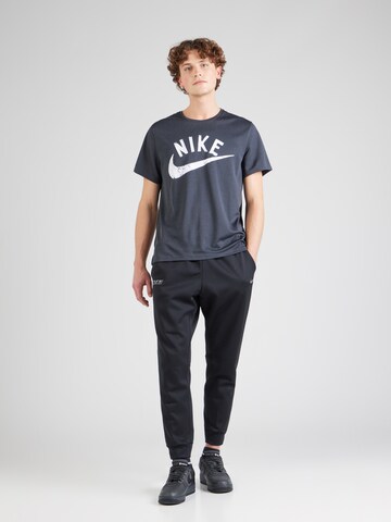 NIKE Tapered Παντελόνι φόρμας σε μαύρο