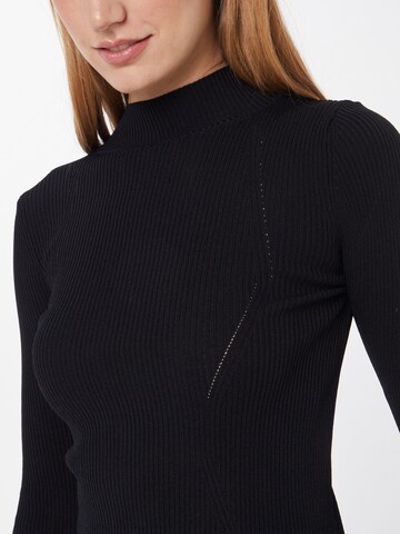 GUESS Pullover in Schwarz