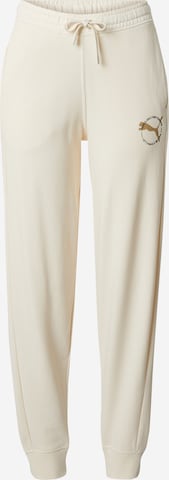 PUMA - Tapered Pantalón deportivo en beige: frente