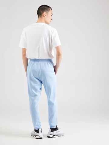 Effilé Pantalon de sport 'FEELCOZY' ADIDAS SPORTSWEAR en bleu