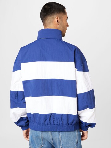 Tommy Jeans Between-Season Jacket 'Timeless' in Blue