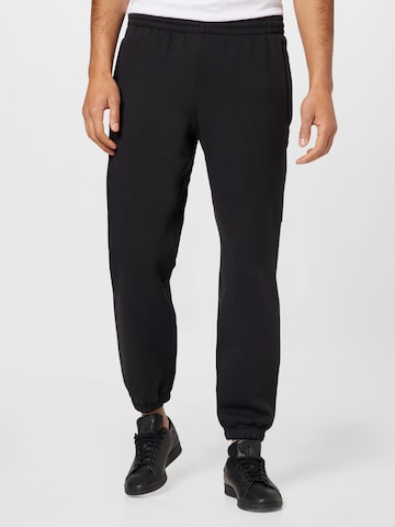 ADIDAS ORIGINALS Tapered Pants 'Premium Essentials' in Black: front