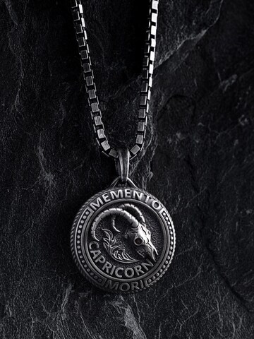 Brelocuri 'CAPRICORN. MEMENTO MORi' de la REYTEL pe argintiu