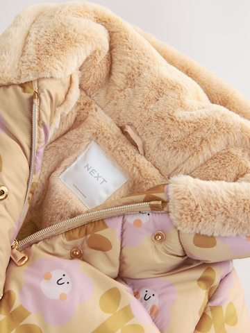 Next Välikausitakki värissä keltainen