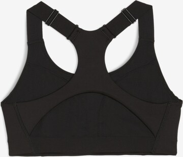 Bustino Reggiseno sportivo '4Keeps' di PUMA in nero