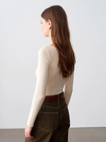 Body a camicia di Dilvin in beige