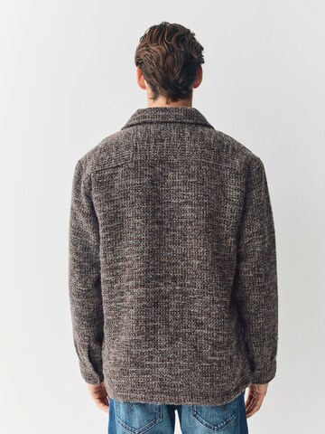 Next Tussenjas in Bruin