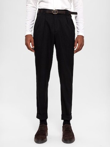 Antioch Tapered Trousers in Black: front