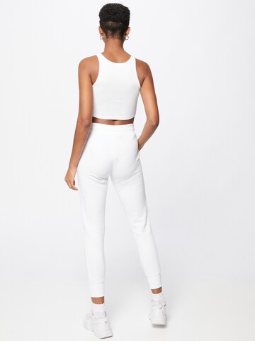 ELLESSE Tapered Pants 'QUEENSTOWN' in White