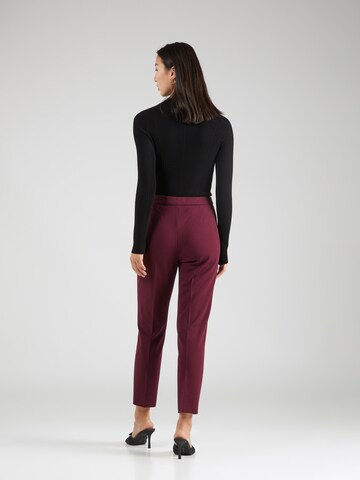 Regular Pantalon à plis 'TILUNARA' BOSS en rouge