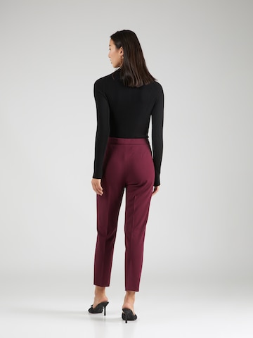 Regular Pantalon à plis 'TILUNARA' BOSS Black en rouge
