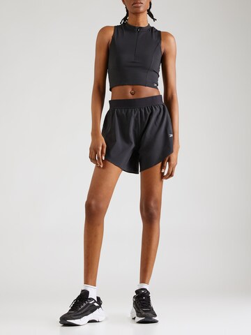 Regular Pantaloni sport de la Reebok pe negru: față