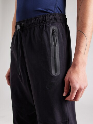 Nike Sportswear Tapered Trousers in Black