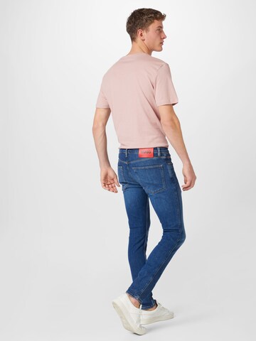 HUGO Red Slimfit Jeans 'HUGO 734' in Blauw