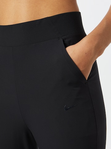 NIKE Tapered Sporthose 'Bliss Luxe' in Schwarz