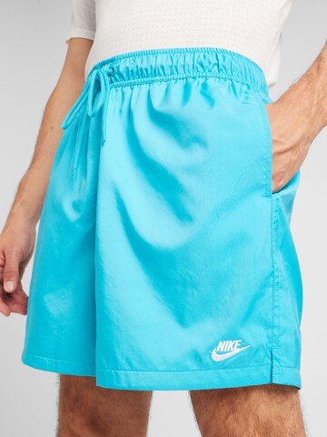 Nike Sportswear Ohlapna forma Hlače 'Club' | modra barva