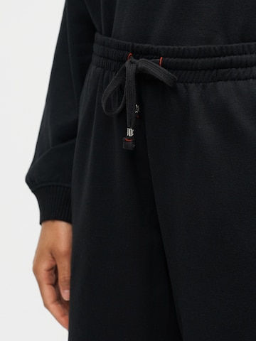 DIESEL Loosefit Byxa 'INDRA-D-CORE' i svart