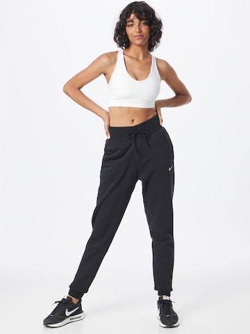 Nike Sportswear Zúžený Kalhoty 'PHOENIX' – černá