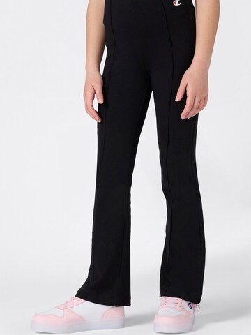Champion Authentic Athletic Apparel Flared Trousers 'Jazz' in Black: front