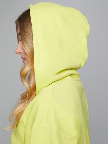 ABOUT YOU x Sharlota Zip-Up Hoodie 'Inaya' in Green