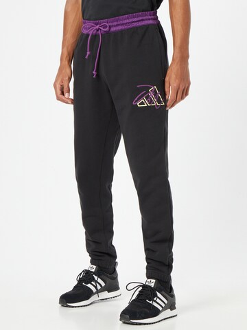 ADIDAS PERFORMANCE Tapered Workout Pants 'DAME 8' in Black: front