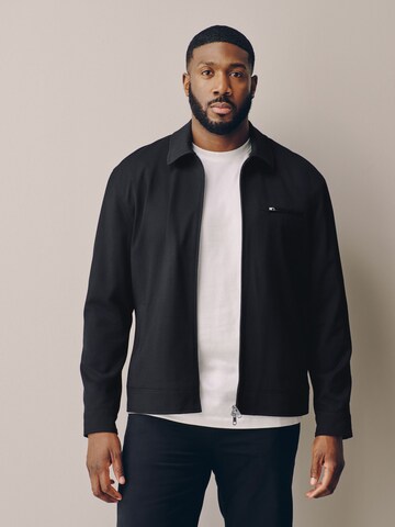 Next Between-Season Jacket 'Motionflex' in Black: front