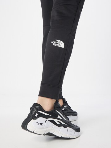 THE NORTH FACE Tapered Outdoorbyxa 'Reaxion' i svart