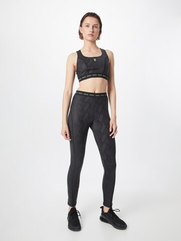 Slimfit Pantaloni sport de la Juicy Couture Sport pe negru