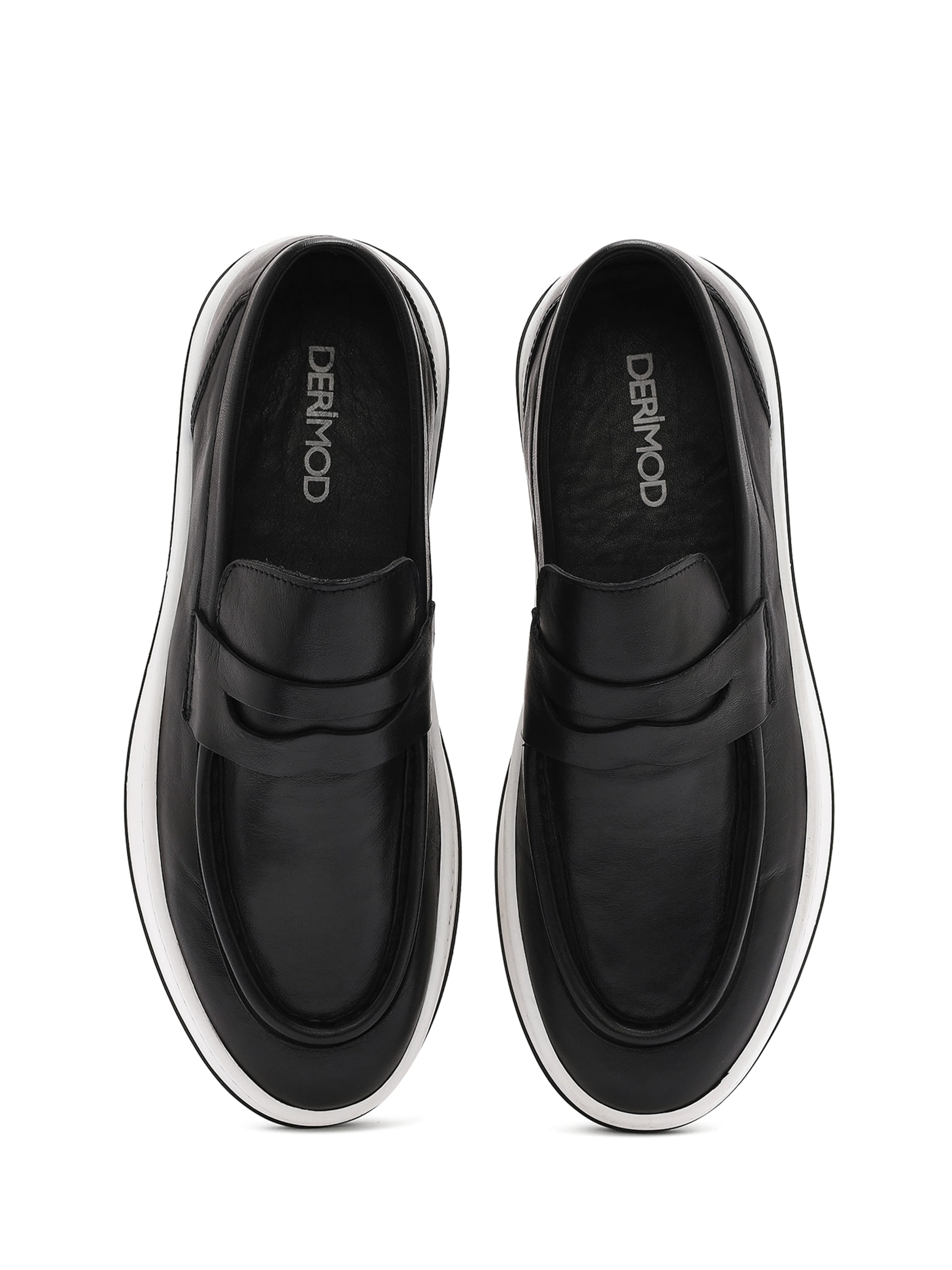 Slipper di Derimod in nero
