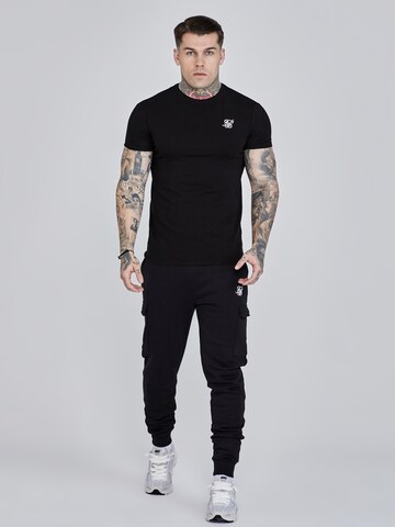 Effilé Pantalon cargo SikSilk en noir