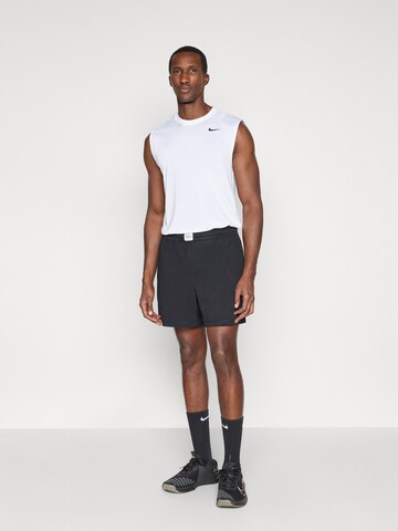 NIKE Ohlapna forma Športne hlače | črna barva