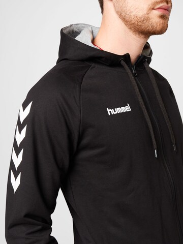 Hummel Sportsweatjacke in Schwarz