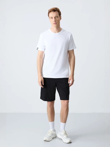 Tommy Life Regular Sportbroek in Zwart: voorkant